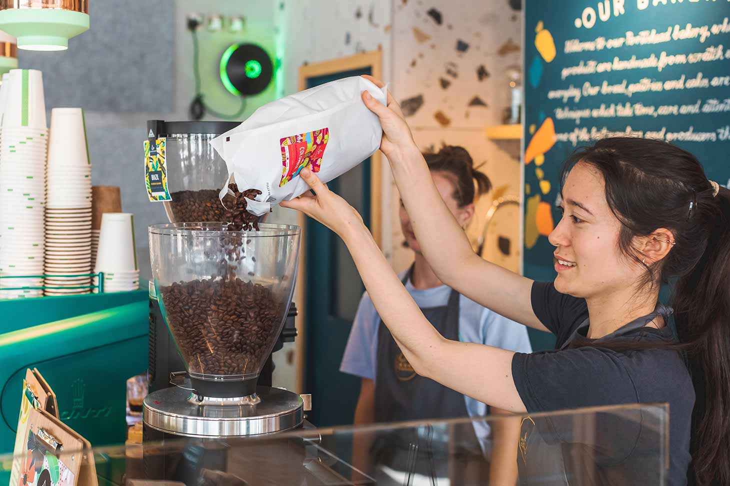 Barista tamping espresso